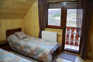 Фото номера Люкс с балконом Гостевой дом Teremok Guest House г. Вышка 8